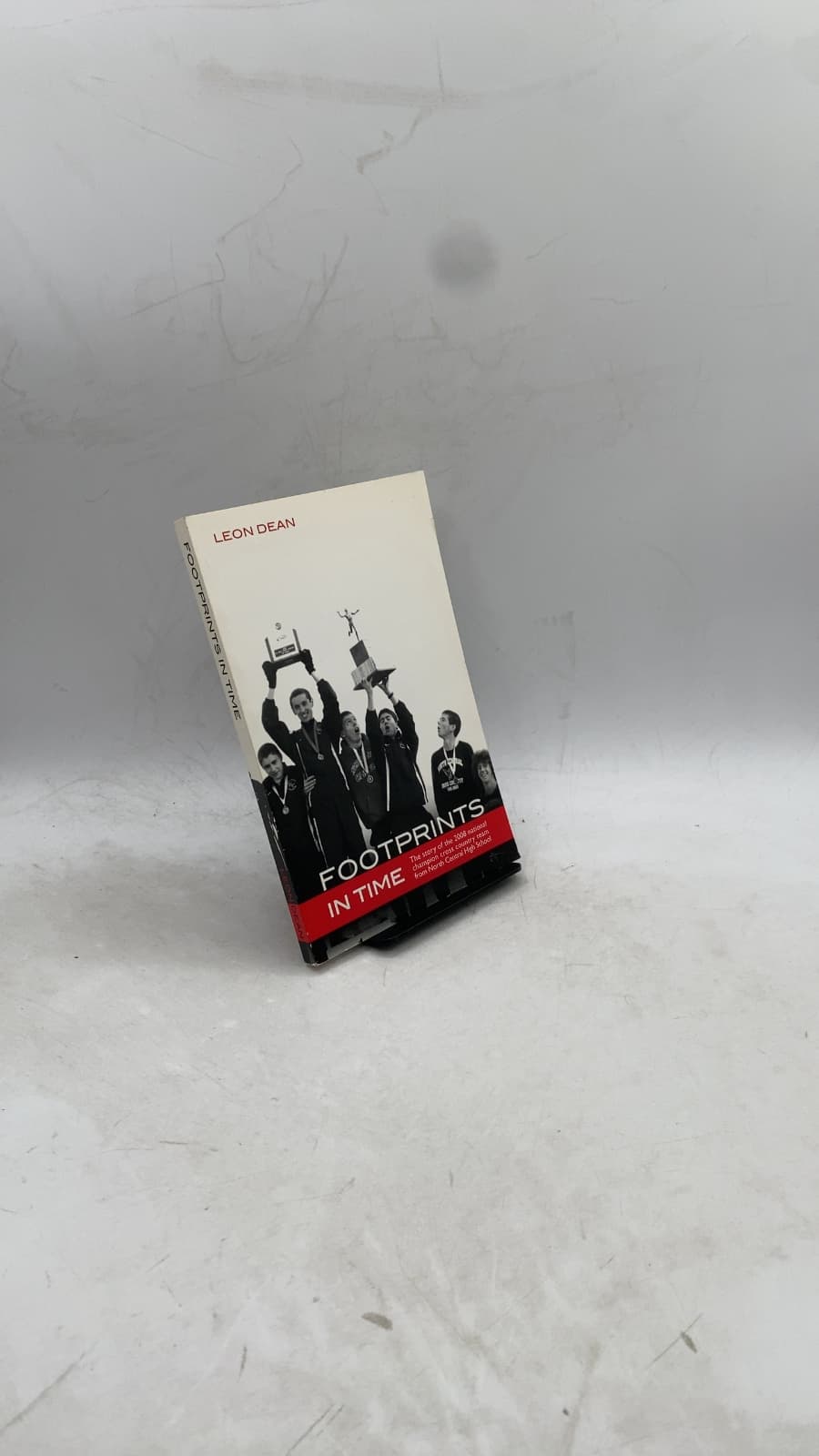 Footprints in Time: The story of the 2008 national champion cross country team from North Central High School by Leon Dean - front cover