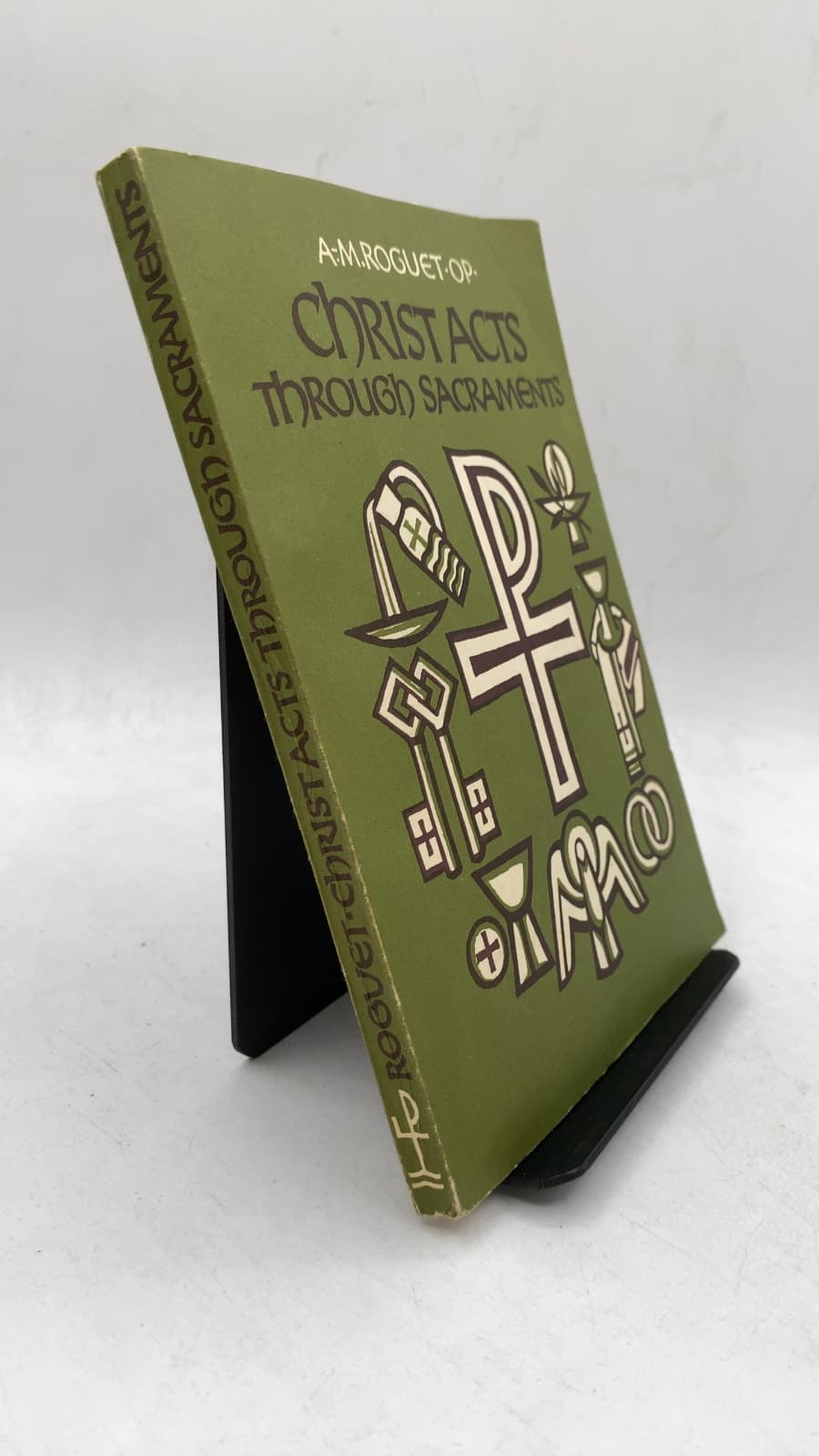 Christ Acts Through THE Sacraments by A.-M. Roguet, O.p. - front cover