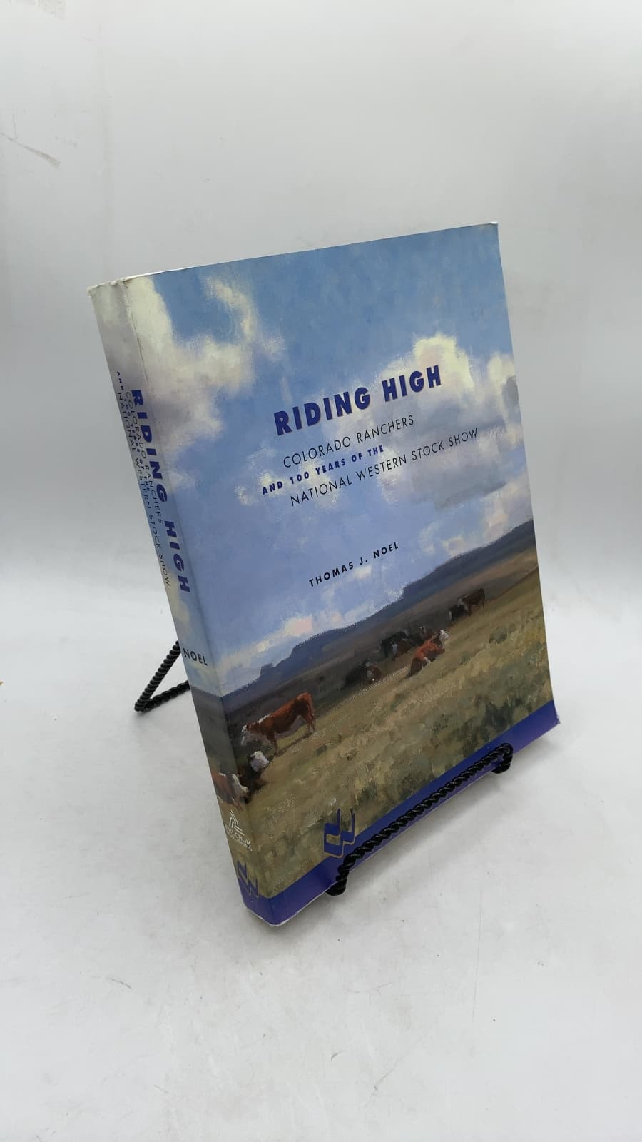 Riding High: Colorado Ranchers and 100 Years of the National Western Stock Show by Thomas J. Noel - front cover