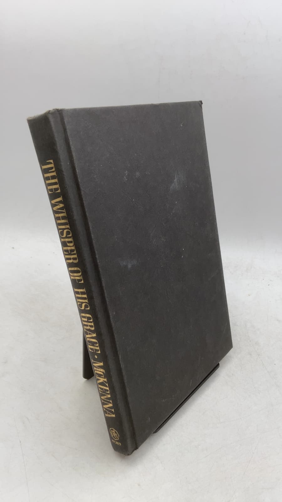 The Whisper of His Grace by David L. McKenna - front cover
