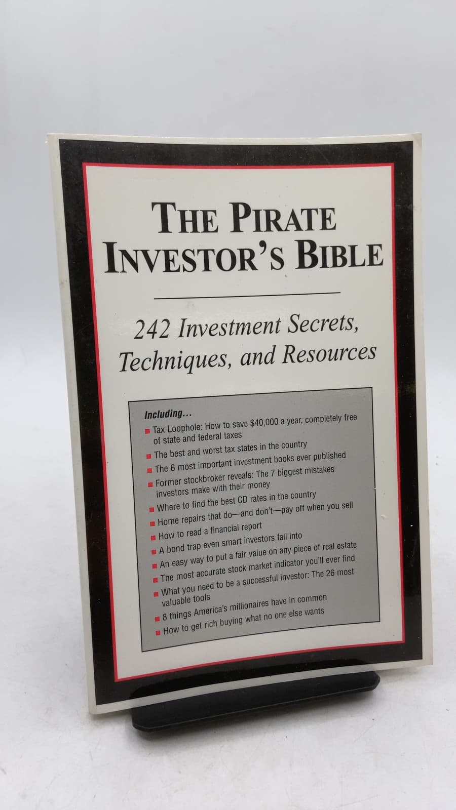 The Pirate Investor's Bible: 242 Investment Secrets, Techniques, and Resources by Porter Stansberry, Dr. Steve Sjuggerud, Dan Ferris, Dave Lashmet, Mike Palmer - front cover